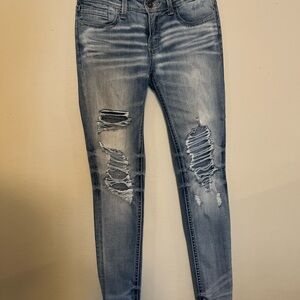 Buckle Light Blue Distressed Skinny Jeans